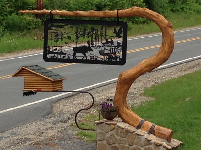 metal ranch sign moose deer eagle railing panel street view