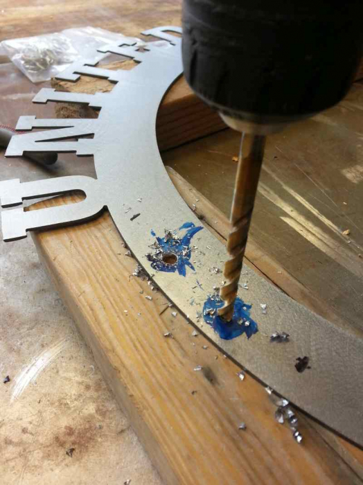metal art fabrication shop drill press precision